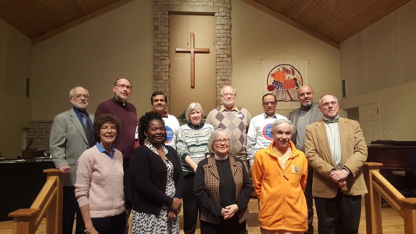 AMAN representatives with members of the First Congregational Church